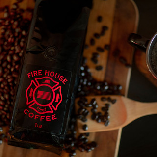 Firehouse-coffeebag-woodenboard-coffeebeans.jpeg