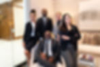 crush city team posing for phone in conference room