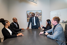 Professionals discussing around a conference table