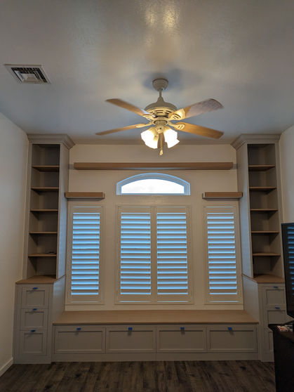 Custom designed built-in shelving and storage with bench seating