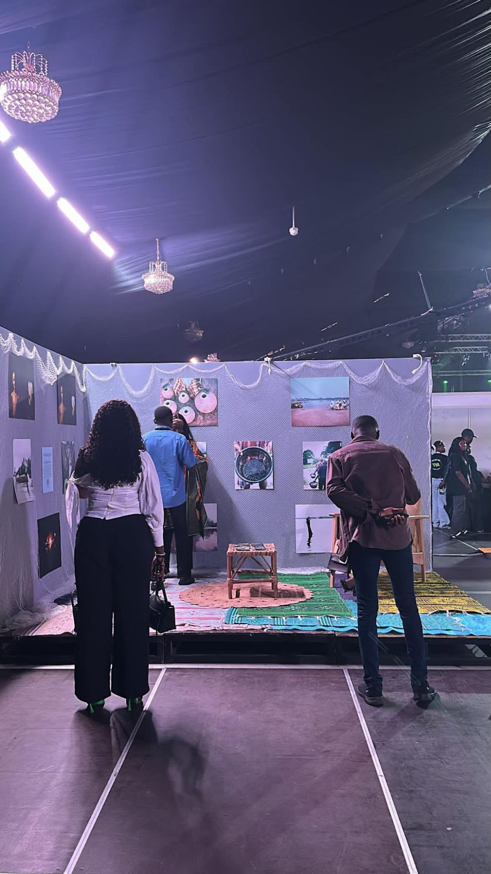 People viewing art in a gallery setting.