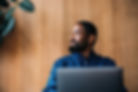 smiling man on laptop - iStock-2230239887_edited.jpg