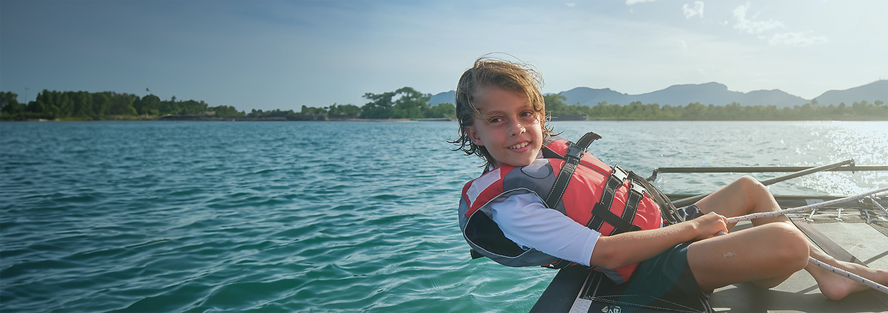 content-child-smiling-during-cruise-on-yacht-2023-11-27-05-23-39-utc.png
