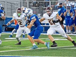 Red Devils fall to Tigers in defensive battle