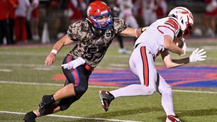 Trojans capitalize on key 2nd half moments to outlast Redmen in shootout