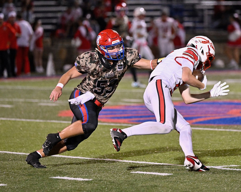 Trojans capitalize on key 2nd half moments to outlast Redmen in shootout