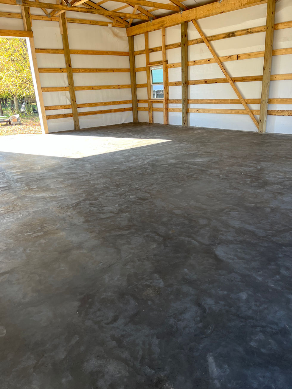 Concrete slab with Trowel Finish pole barn in Shepherdsville, KY