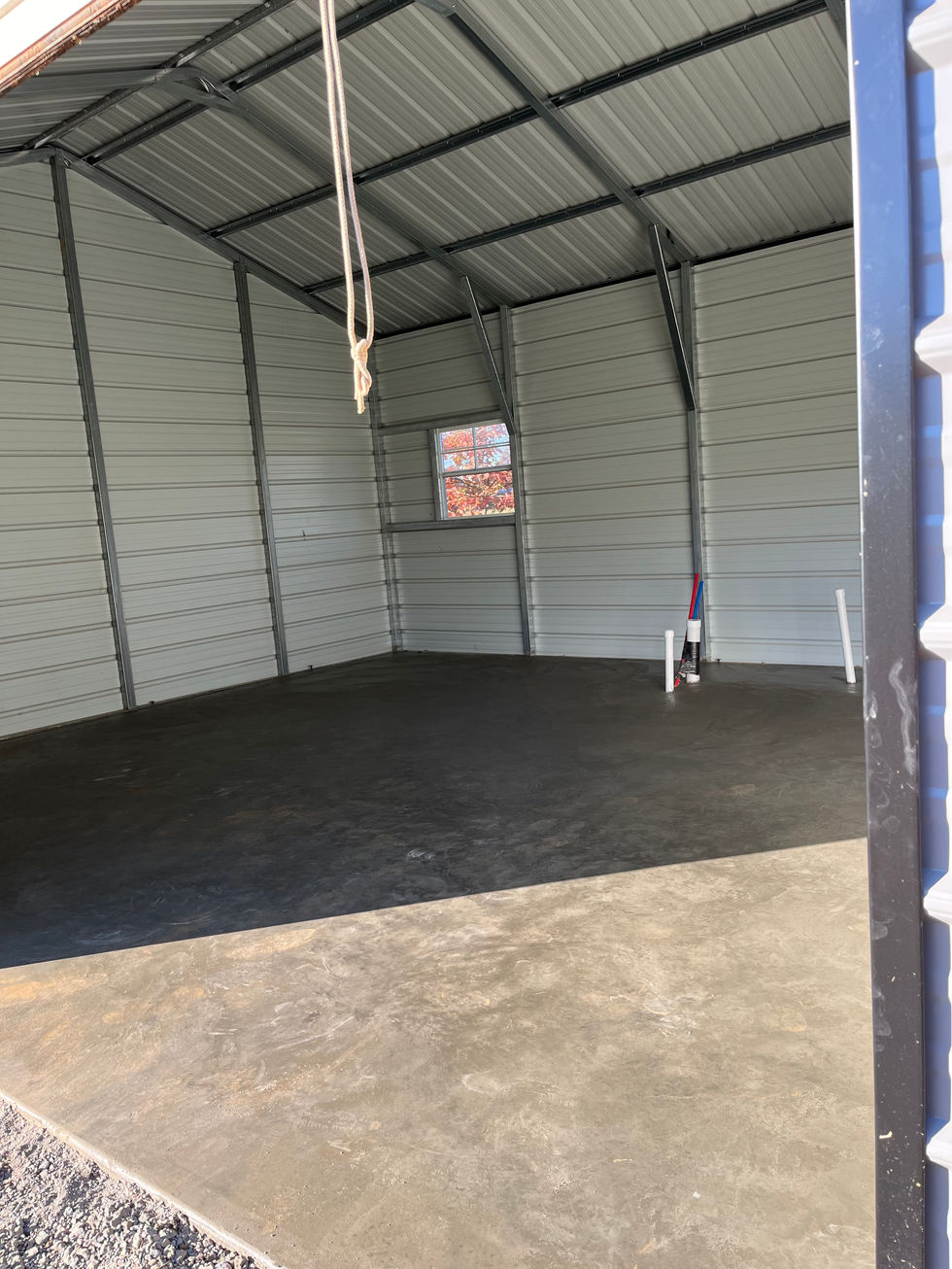 Concrete pad inside a shed near Bardstown, KY with a trowel finish
