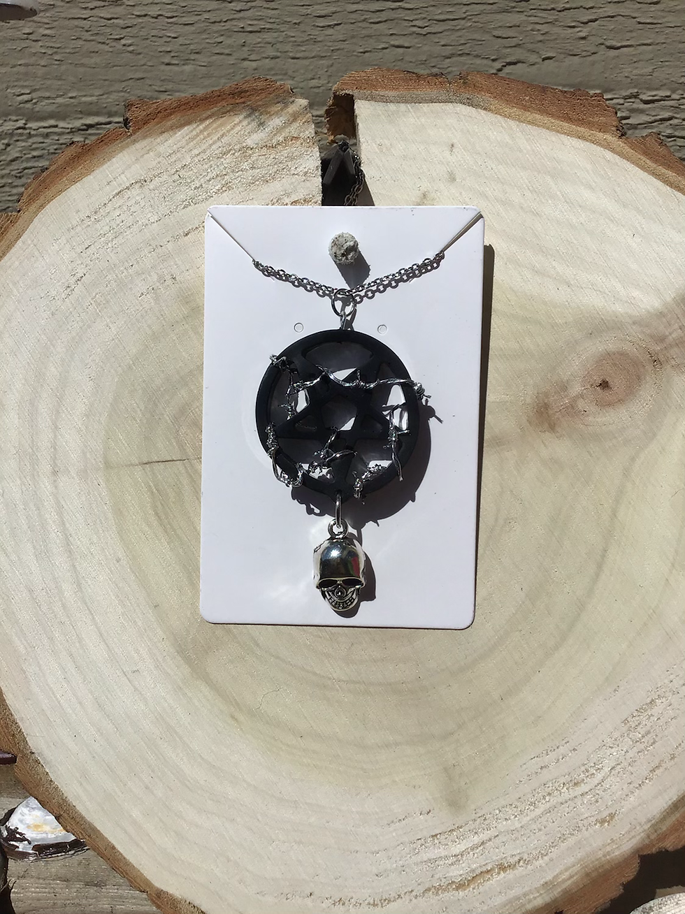 Thumbnail: Handcrafted Barbed Pentagram Pendant