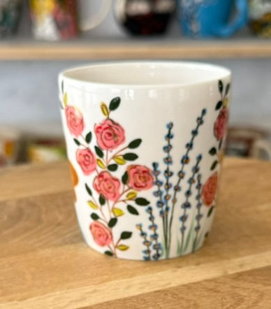 Thumbnail: White ceramic cup with pink roses and lavender floral patterns. ChernyArtStudio