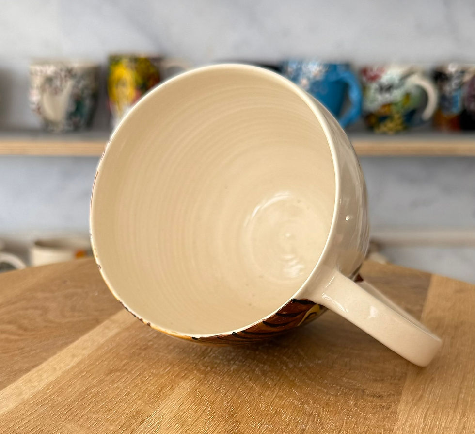 Thumbnail: Ceramic mug interior view, beige color, handle, brown wooden surface, ChernyArtStudio