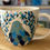 Thumbnail: Large ceramic mug with blue bird and floral design, ChernyArtStudio.