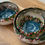 Thumbnail: Three ceramic bowls with floral designs and intricate details. ChernyArtStudio