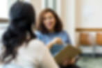 Two women talking in doctor's office