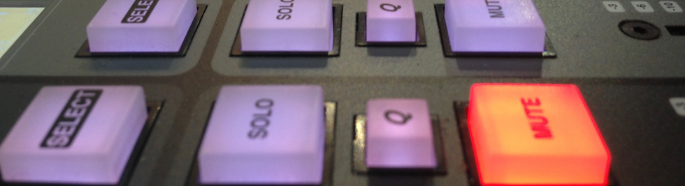 close up of an SSL live mixing console buttons