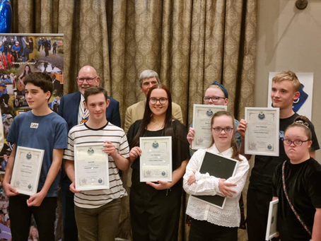 Members receive awards at the DABGC