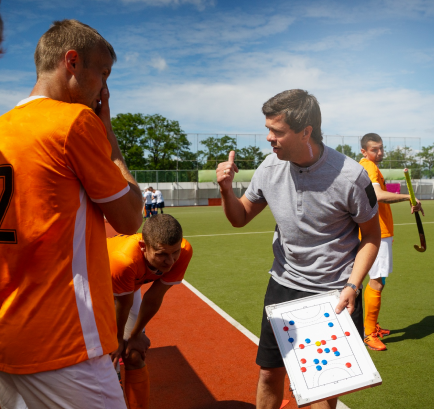 People in soccer field