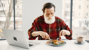 old man eating