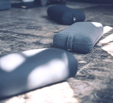 yoga cushions on the floor_edited.jpg