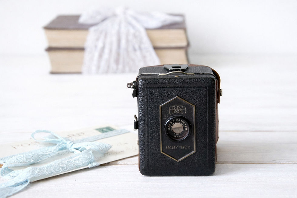 Zeiss Ikon Baby Box vintage box camera front detail, compact 127 roll film camera