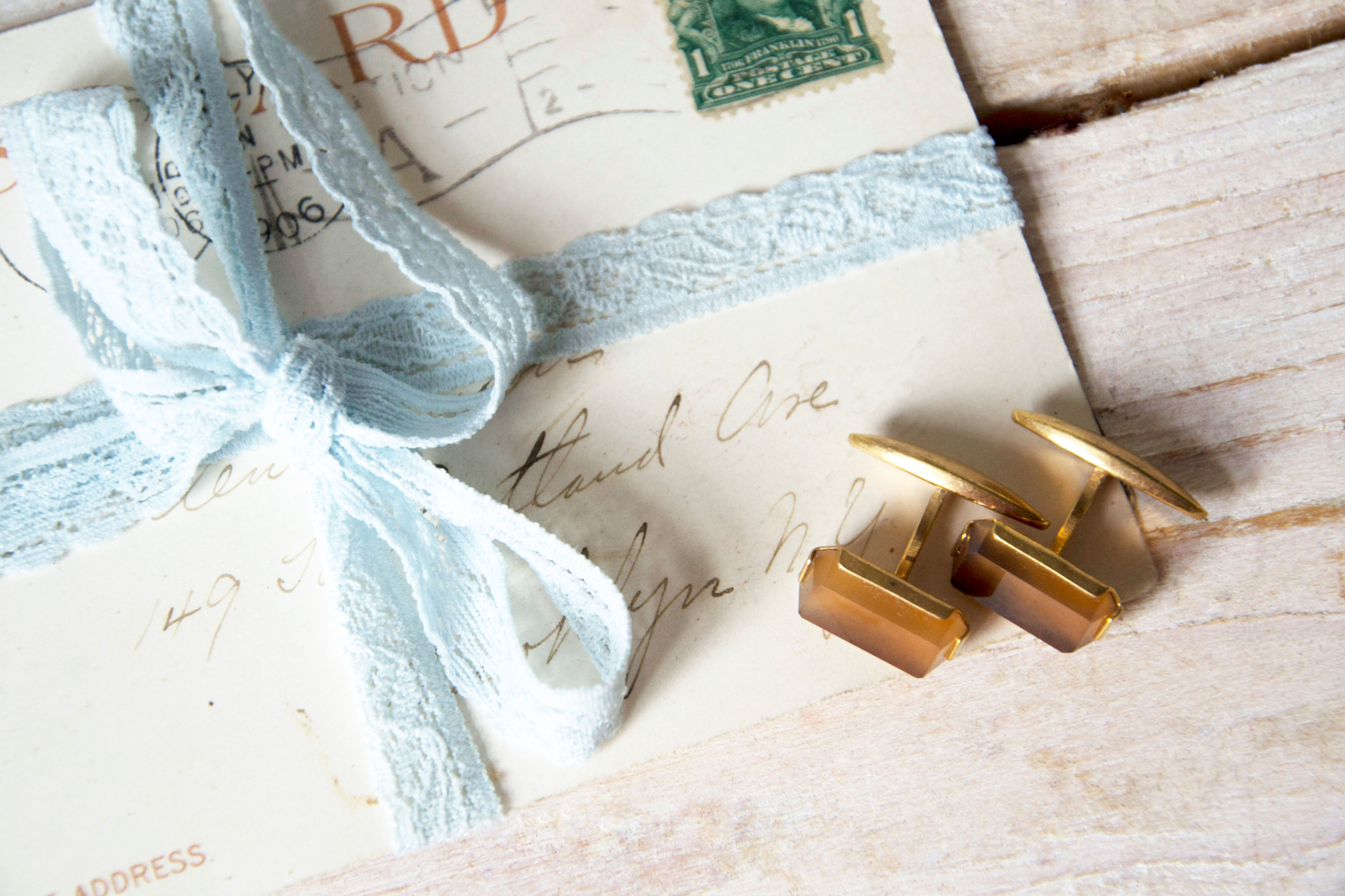 Vintage gold tone metal cuff links with rectangular design
