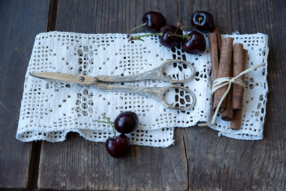 Antique-style silver grape scissors used for serving grapes and small fruit at the dessert table