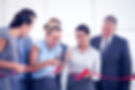 happy-business-team-cutting-red-ribbon.jpg