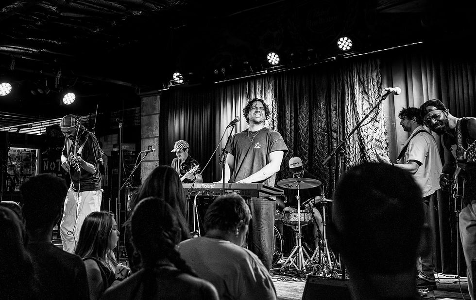 Black and white photo of a band playing musical instruments