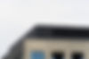 concrete-building-with-mirror-windows-clear-sky_edited.jpg