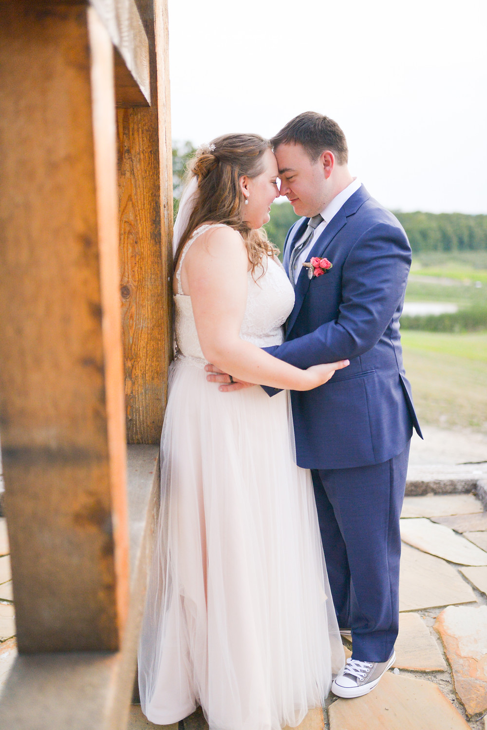 Bride and groom portrait at the rustic barn of Mapleside Farms in Brunswick, Ohio