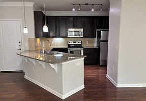 Clean and organized apartment kitchen by Maid to Clean Co.