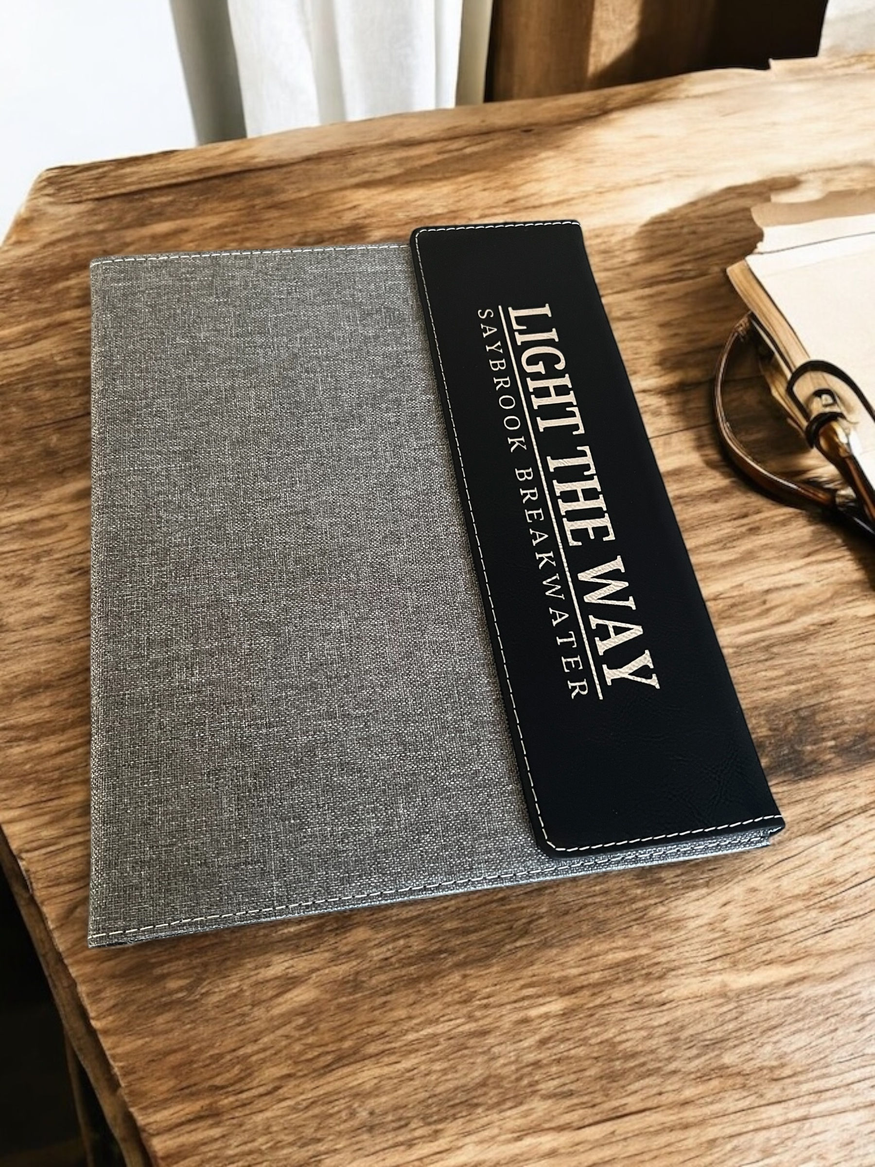 Light The Way portfolio with note pad