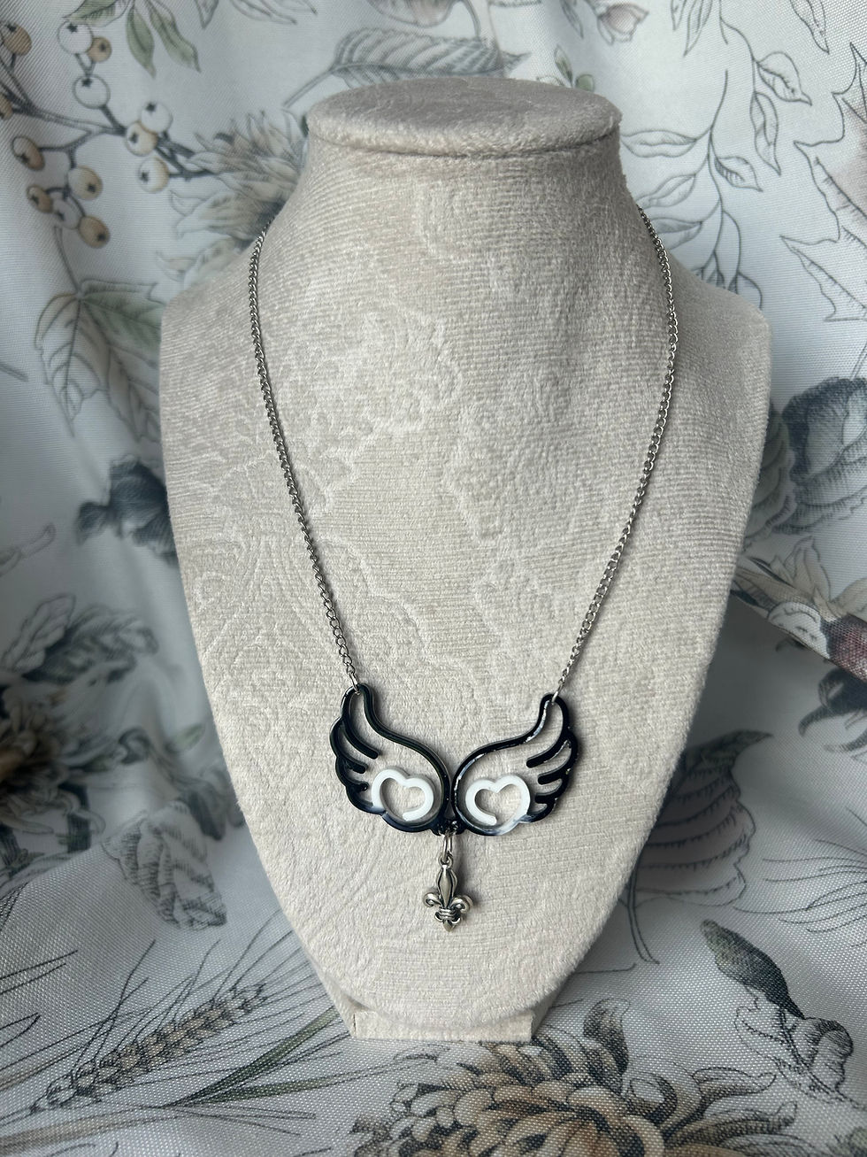 resin winged necklace