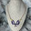 Thumbnail: resin winged necklace