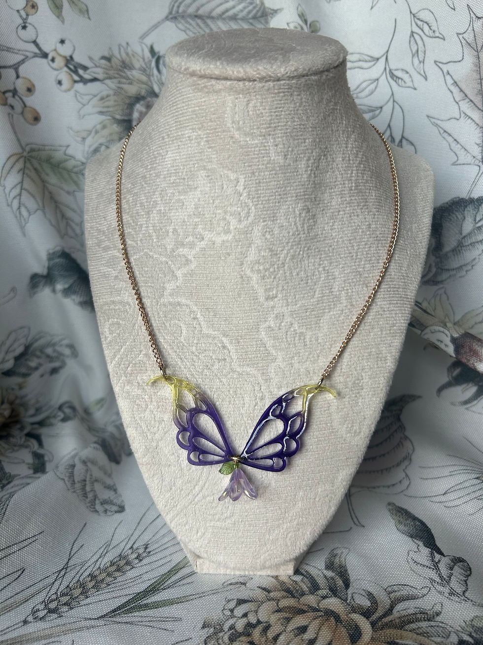 resin winged necklace