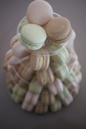 Pale green, brown and pink macaron tower