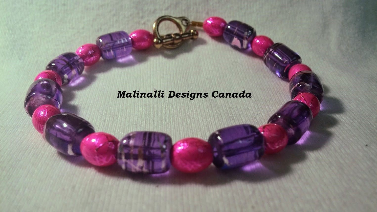 016.- Purple and sweet pink bracelet