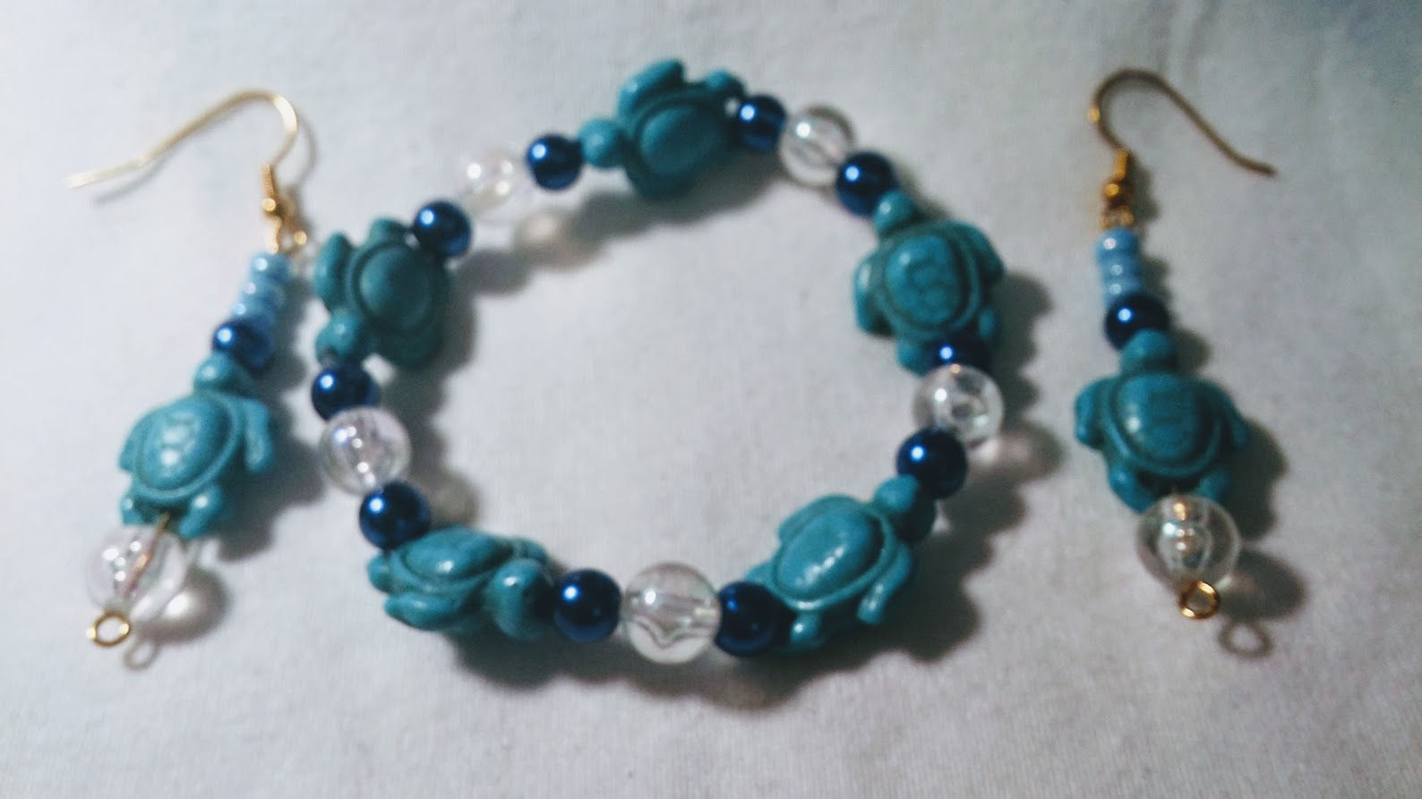 Blue Turtle earrings and bracelets.