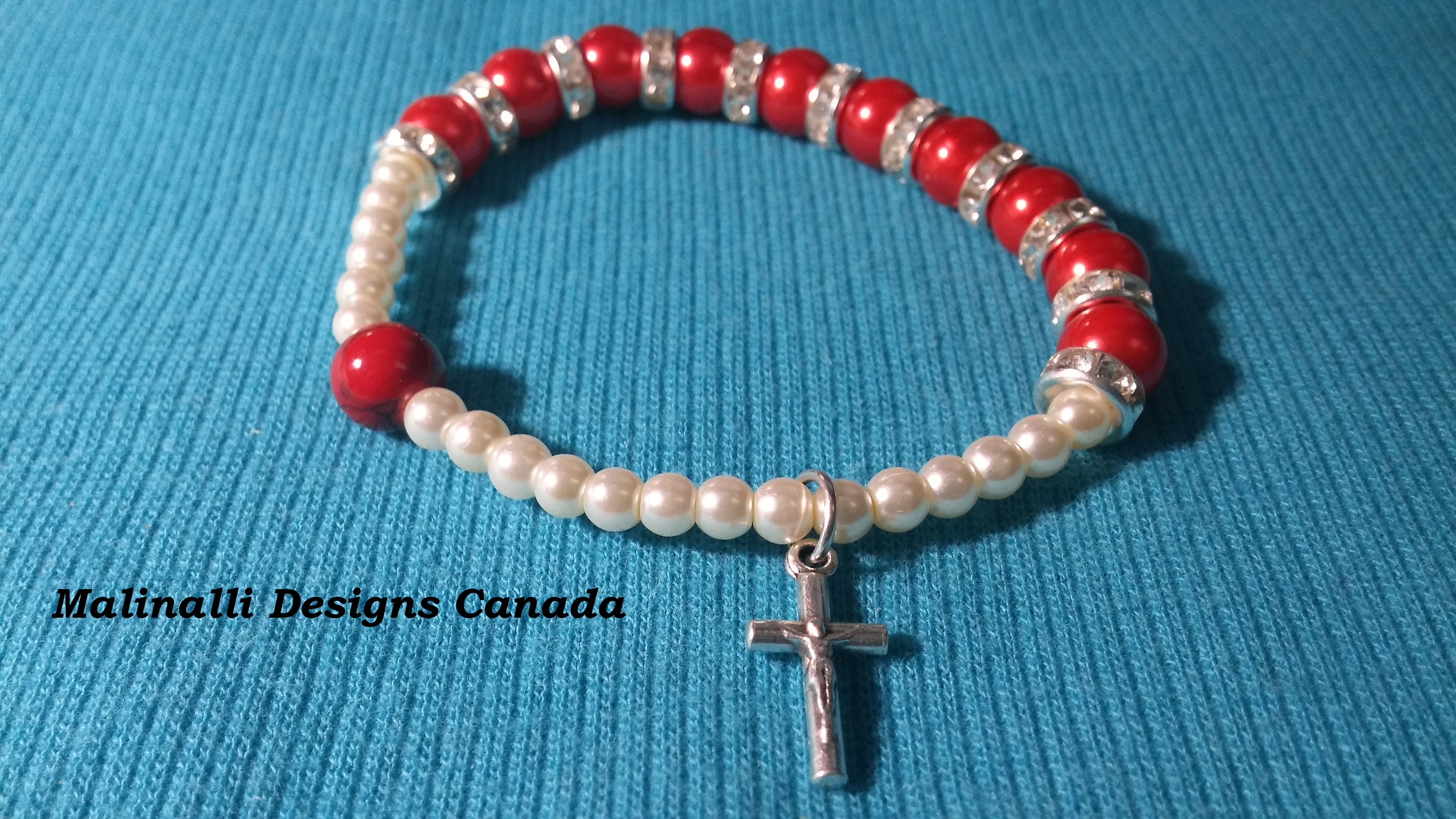 013.- 13,- Red and pearls with crystal and silver cross