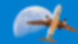 airplane-in-flight-and-blue-sky-with-big-moon-2024-01-30-18-37-57-utc.jpg