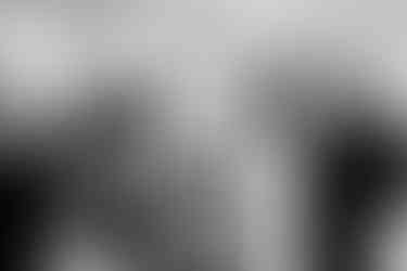 Bride and father walking together during an intimate registry office ceremony