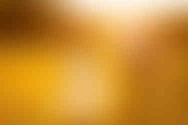 Golden hour portrait of bride and groom in Hertfordshire, by Hektor Lleshi Photography, Hertfordshire wedding photographer