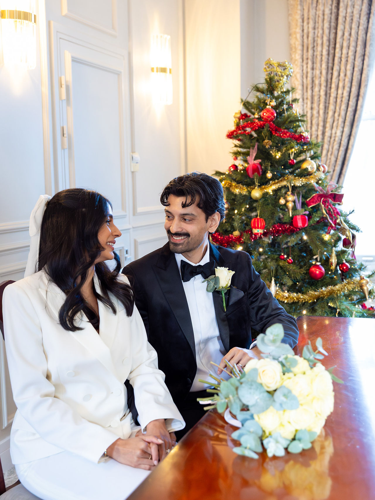 Bride and groom smiling after sealing their marriage