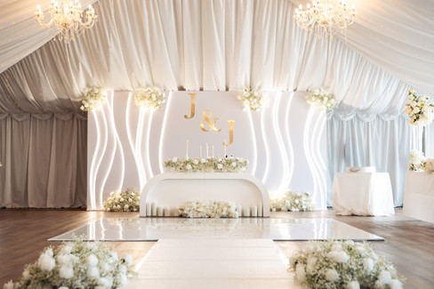 Wedding reception decor inside marquee at London Shenley Club