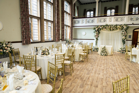 Bride greeting guests before ceremony at Cheshunt Register Office