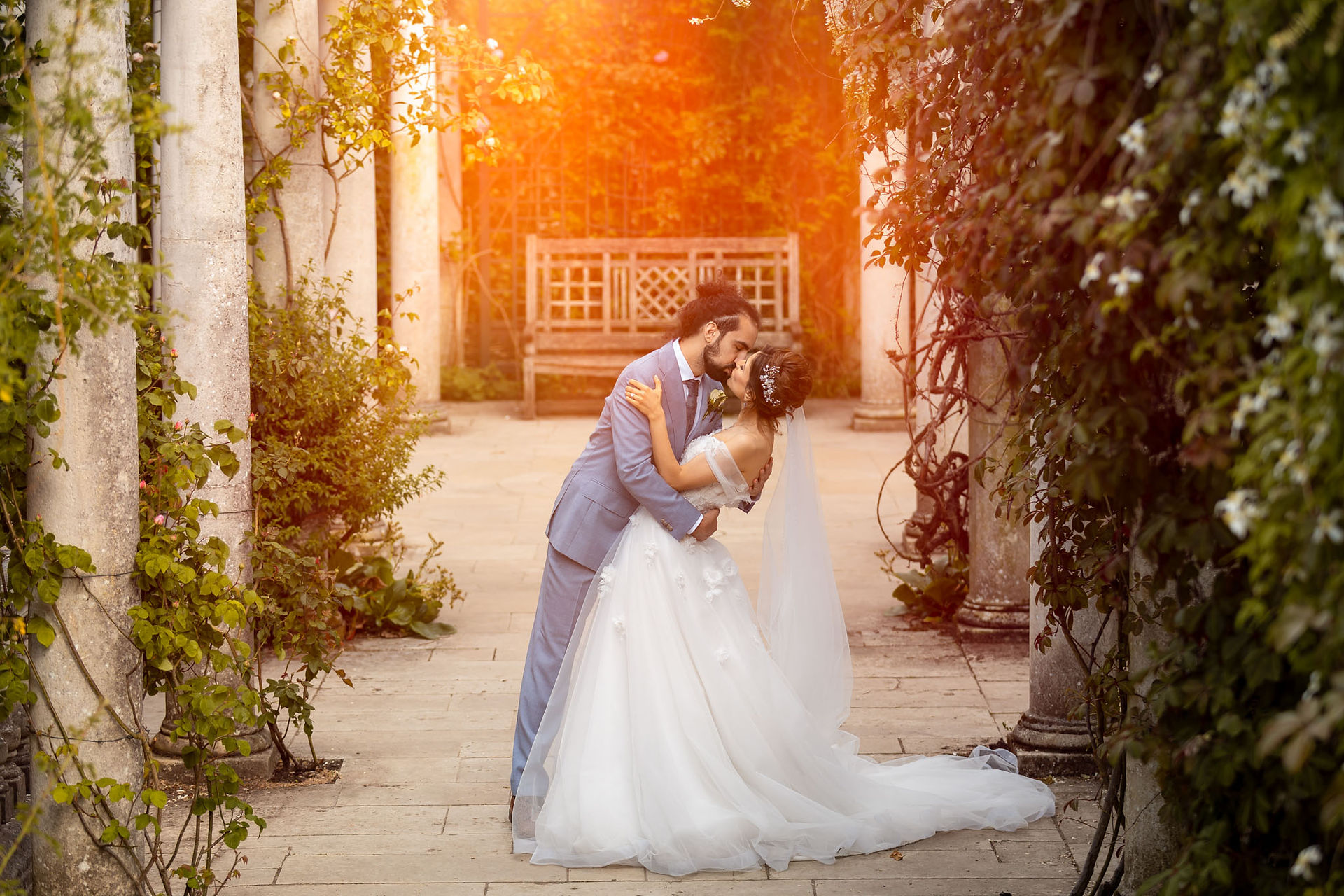 Golden hour wedding portrait in gardens at Cheshunt Register Office, Hertfordshire