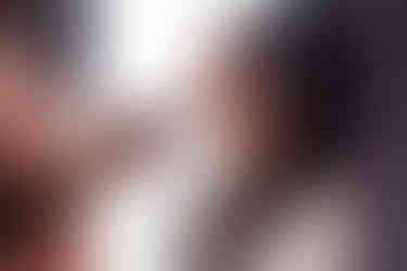 Bride having final makeup touches before ceremony at Hertfordshire wedding venue