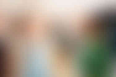 Guests raising hands and celebrating during wedding party in Hertfordshire