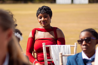 Candid guest portrait during Hertfordshire outdoor wedding ceremony