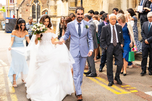 Newlyweds outside Cheshunt Register Office showcasing Hertfordshire wedding photography